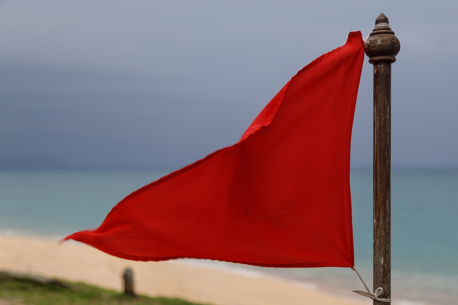 Red warning flag on Mai Khao Beach